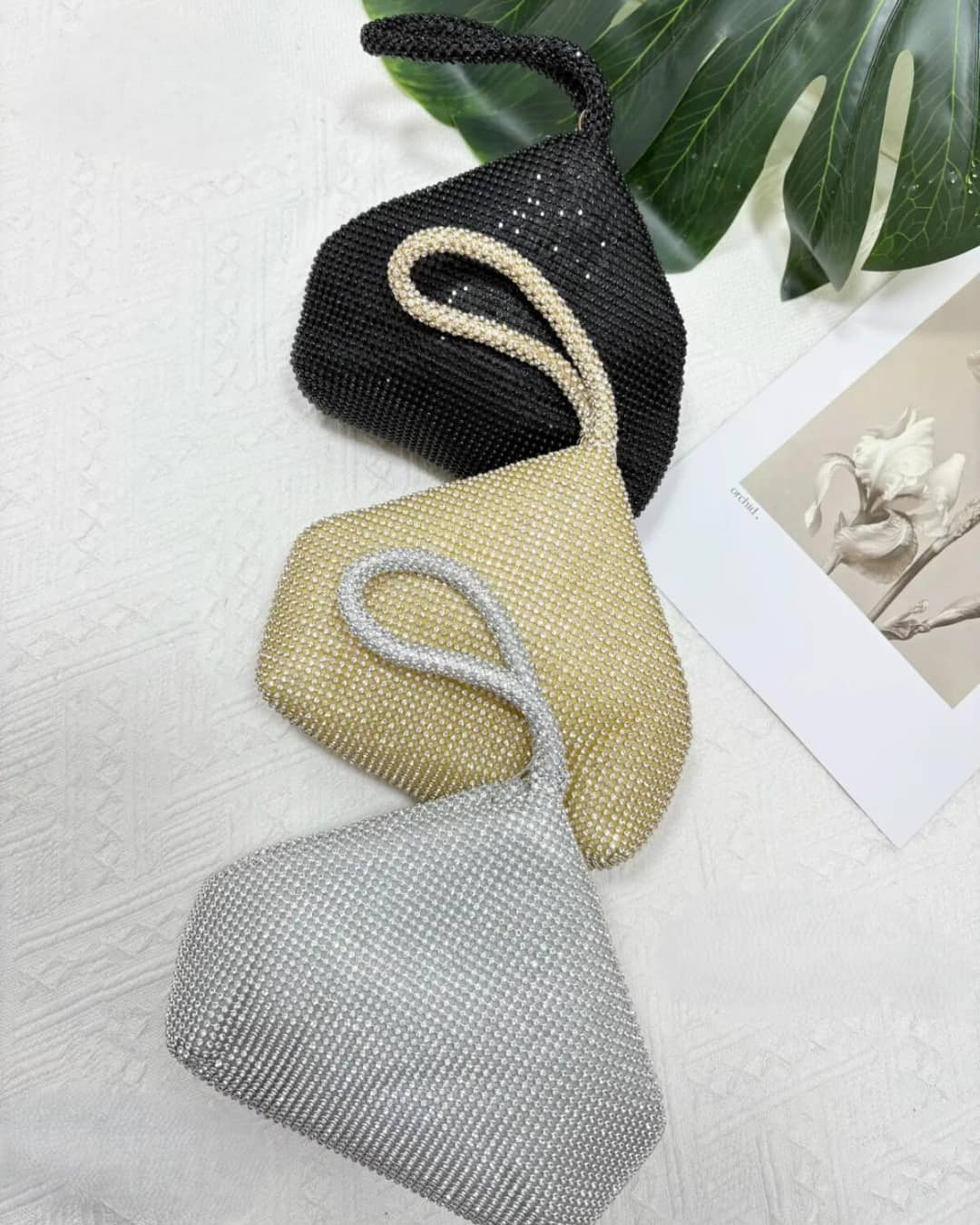 Bolso brillante de mano